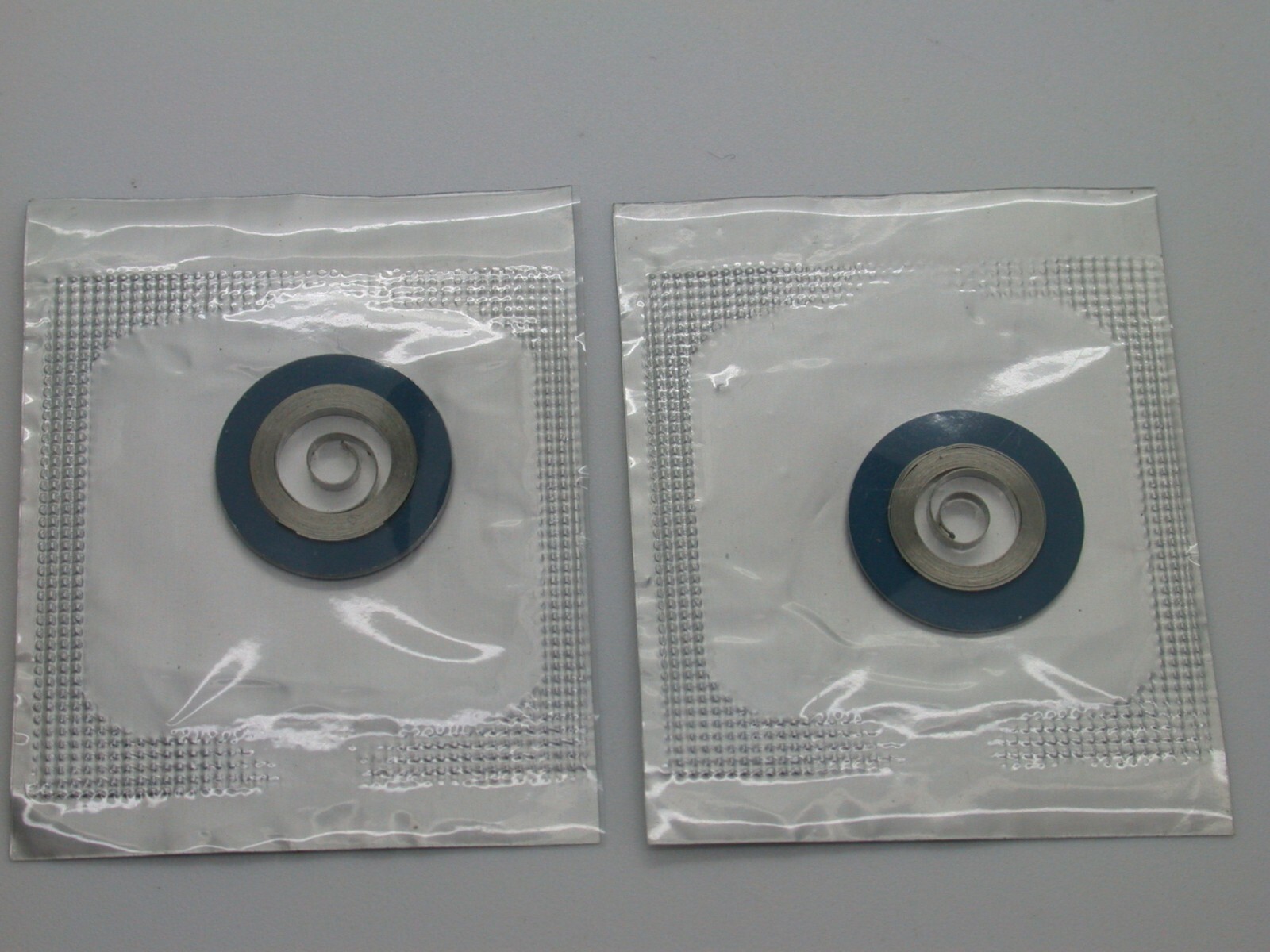 WATCHMAKERS OMEGA CAL 861, PT NO. 1208 – MAINSPRING (2)–VINTAGE PARTS–17MF35