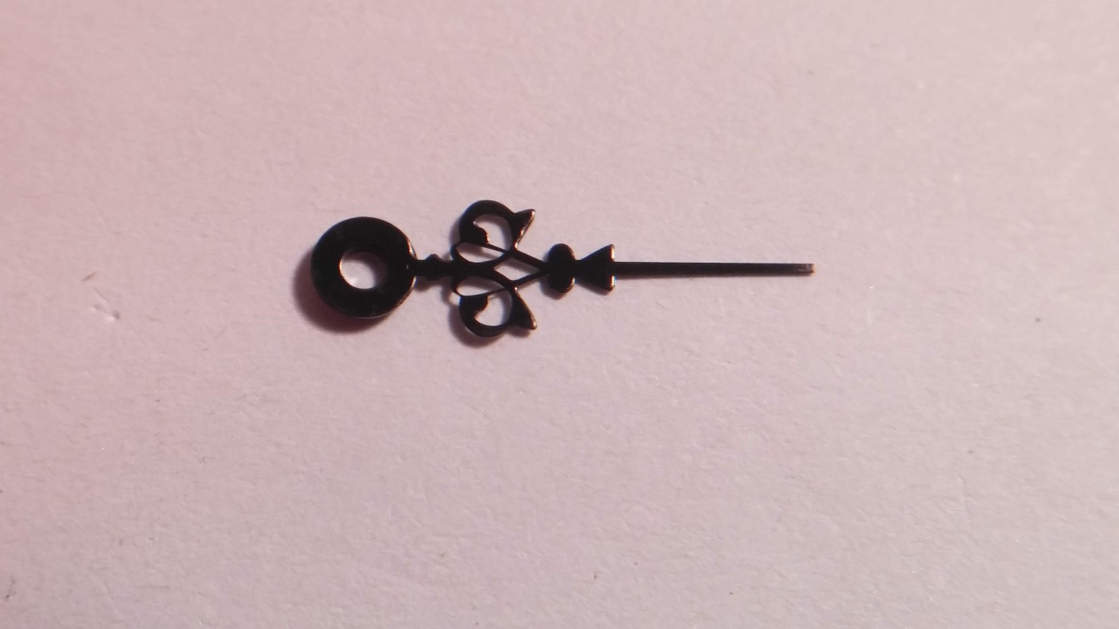 Louis XIV hand BLACK, 12mm from bottom of circle. 130/32. 246