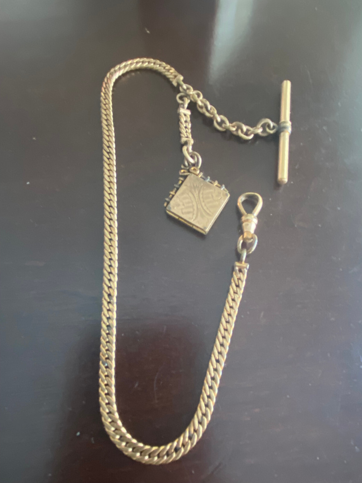 VINTAGE SIMMONS 11 INCH POCKET WATCH CHAIN, YELLOW GOLD FILLED WITH LOCKET FOB