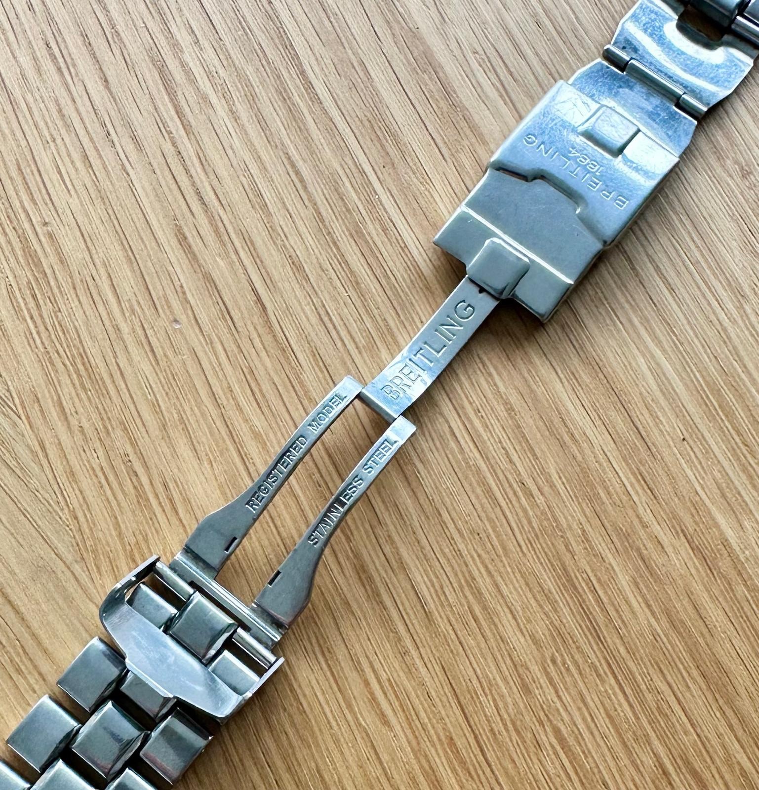 A STAINLESS STEEL BREITLING WRISTWATCH BRACELET 24MM