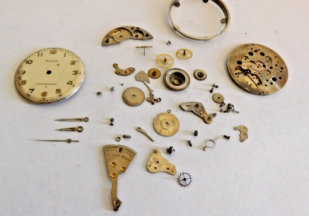 VENUS 5240 LOWER PLATE + PARTS WITH DIAL & MOVEMENT HOLDER. USED