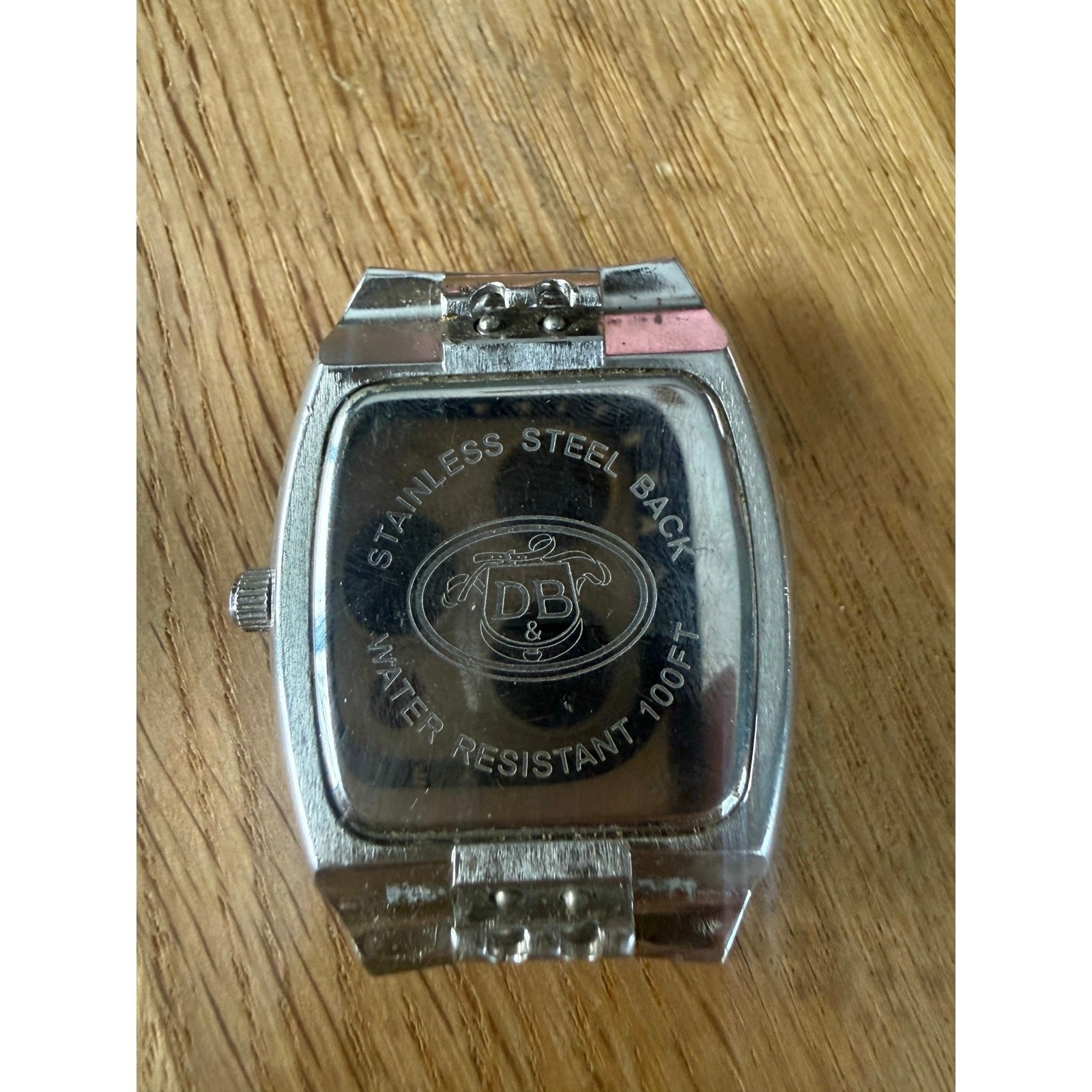 Dooney & Bourke Rainbow Rhinestone-Encrusted Silver-Tone:￼WATCH-FACE ONLY