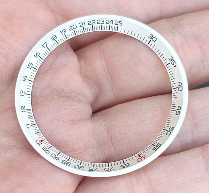 A Breitling Chronograph Navitimer Wristwatch Tachy meter inner bezel.