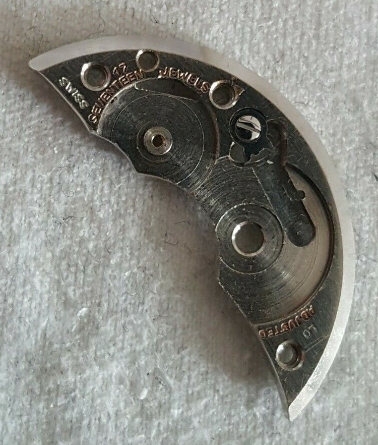 Bulova Caliber 10BC Part EB Number 105 (Barrel Bridge + Click and Screw)