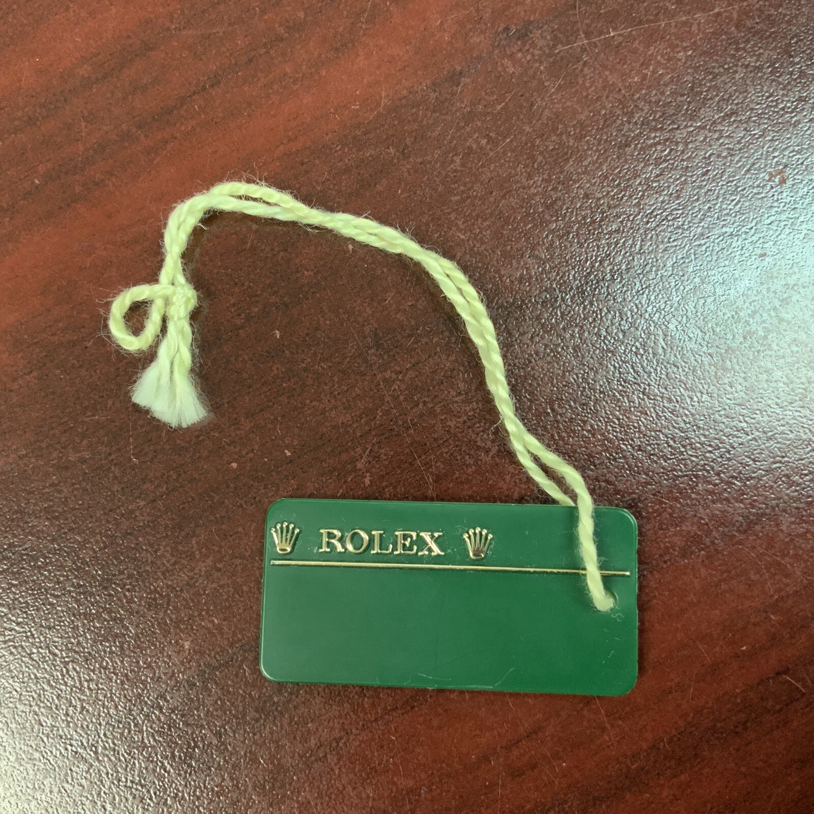 ROLEX GREEN SERIAL HANG TAG