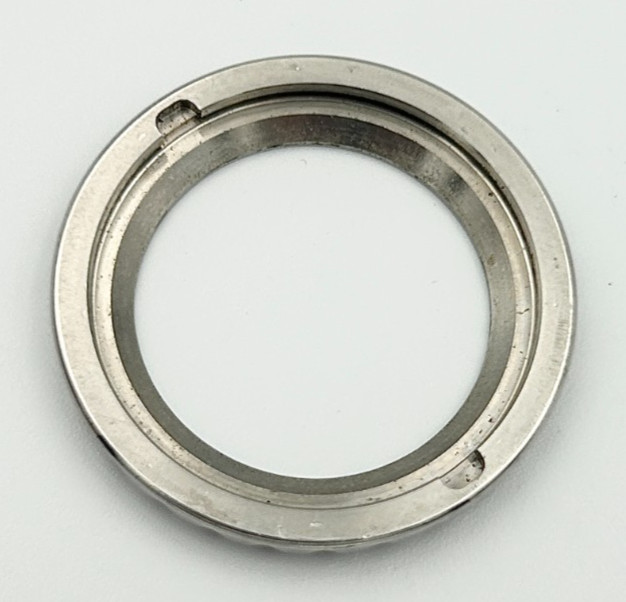 A Chanel J12 Black Ceramic Wristwatch Bezel for midsize model.