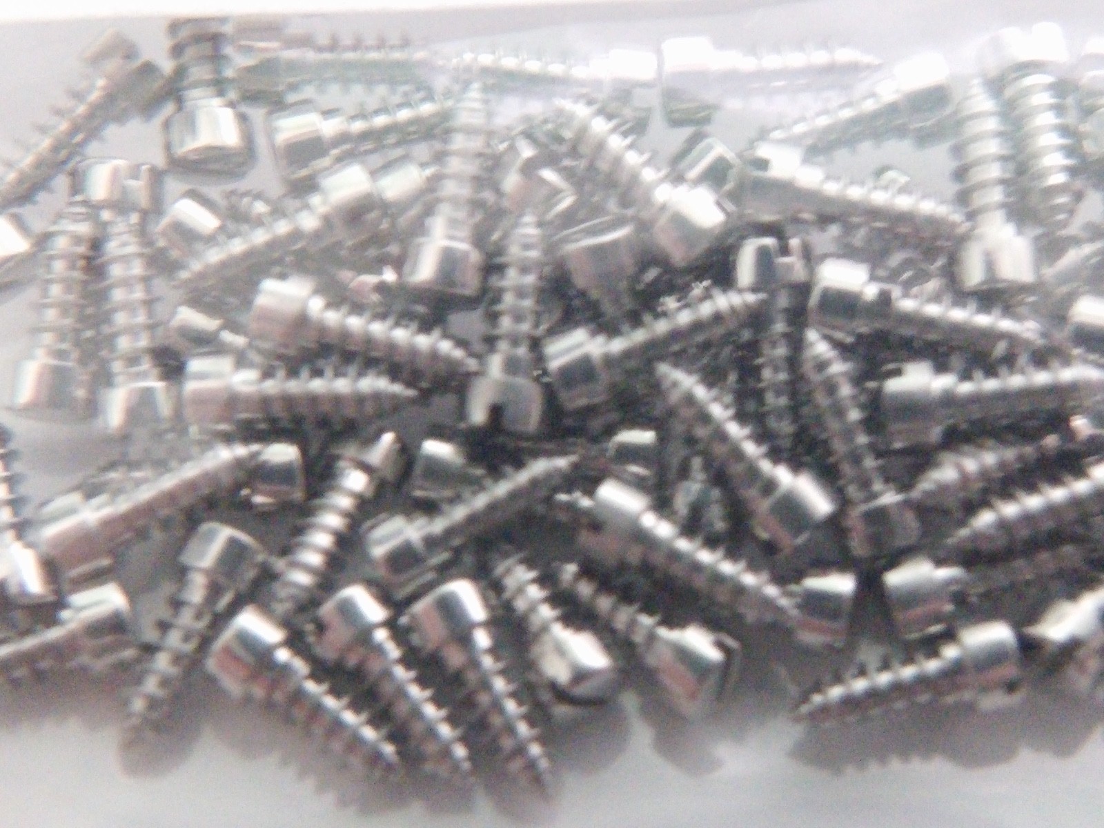 Unbranded case back screws 100 per order-NEW for watch repair