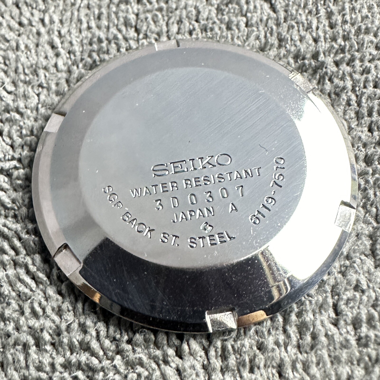 ORIGINAL NOS ‘1973 VINTAGE SEIKO 6119-7510 SGP CASE BACK WITH PROTECTIVE FILM