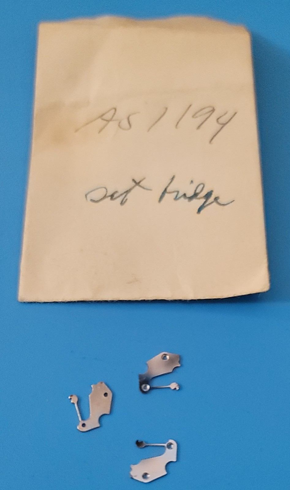 SB2-010: Lot of NOS Watch Parts AS 1187/1194 – Levers, Springs, Staffs, Gears