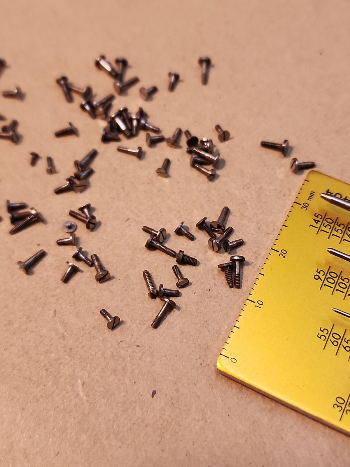 Lot Of 80 Mixed Pocket Watch/Wristwatch Case And Movement Screws Parts Spares