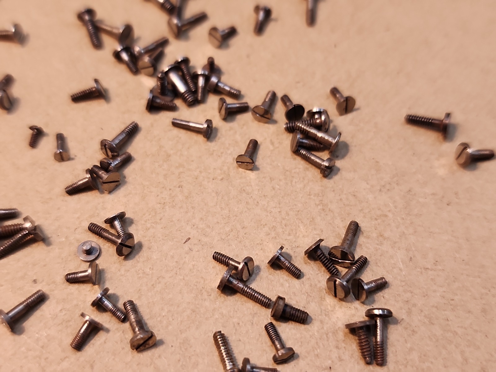 Lot Of 80 Mixed Pocket Watch/Wristwatch Case And Movement Screws Parts Spares