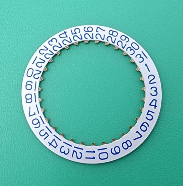 NOS Zodiac 70-72 Olympos Part Date Disk Calendar Wheel White and Blue
