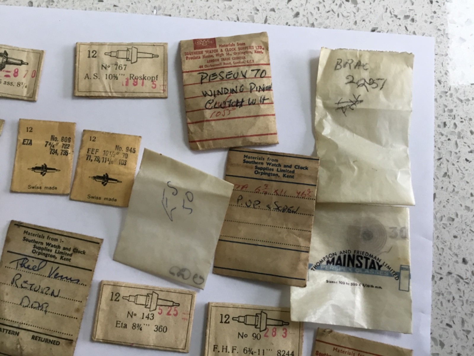 joblot vintage NOS Ronda dcn watch balance staff packets and other parts
