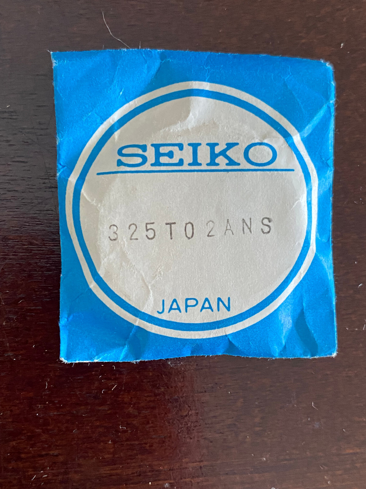 VINTAGE N.O.S. GENUINE SEIKO CRYSTAL , REF # 325TO2ANS, ORIGINAL PACKAGE