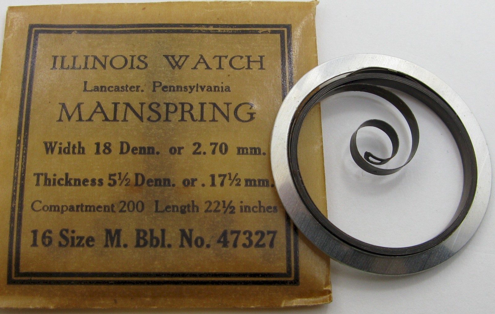 Illinois 16s M Bbl. 47327 T end Watch part: Mainspring x1 brown – blue alloy