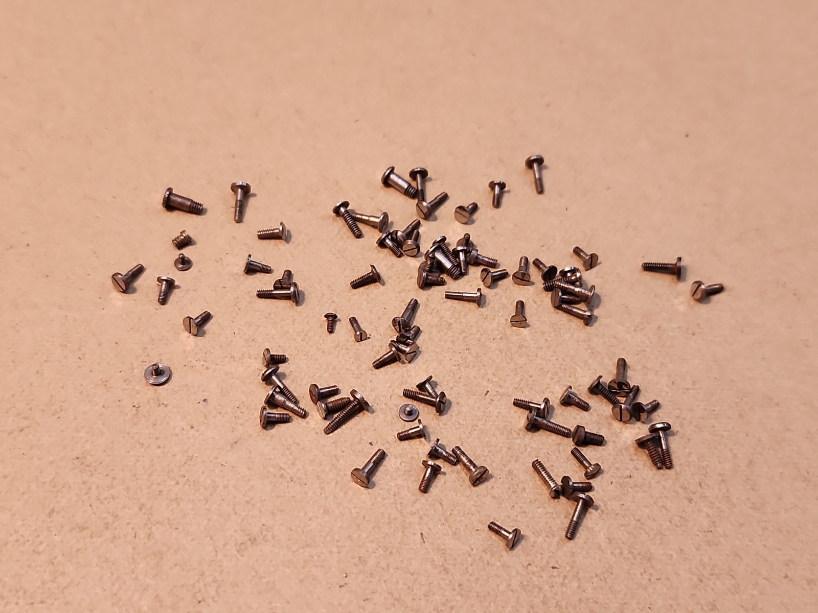 Lot Of 80 Mixed Pocket Watch/Wristwatch Case And Movement Screws Parts Spares