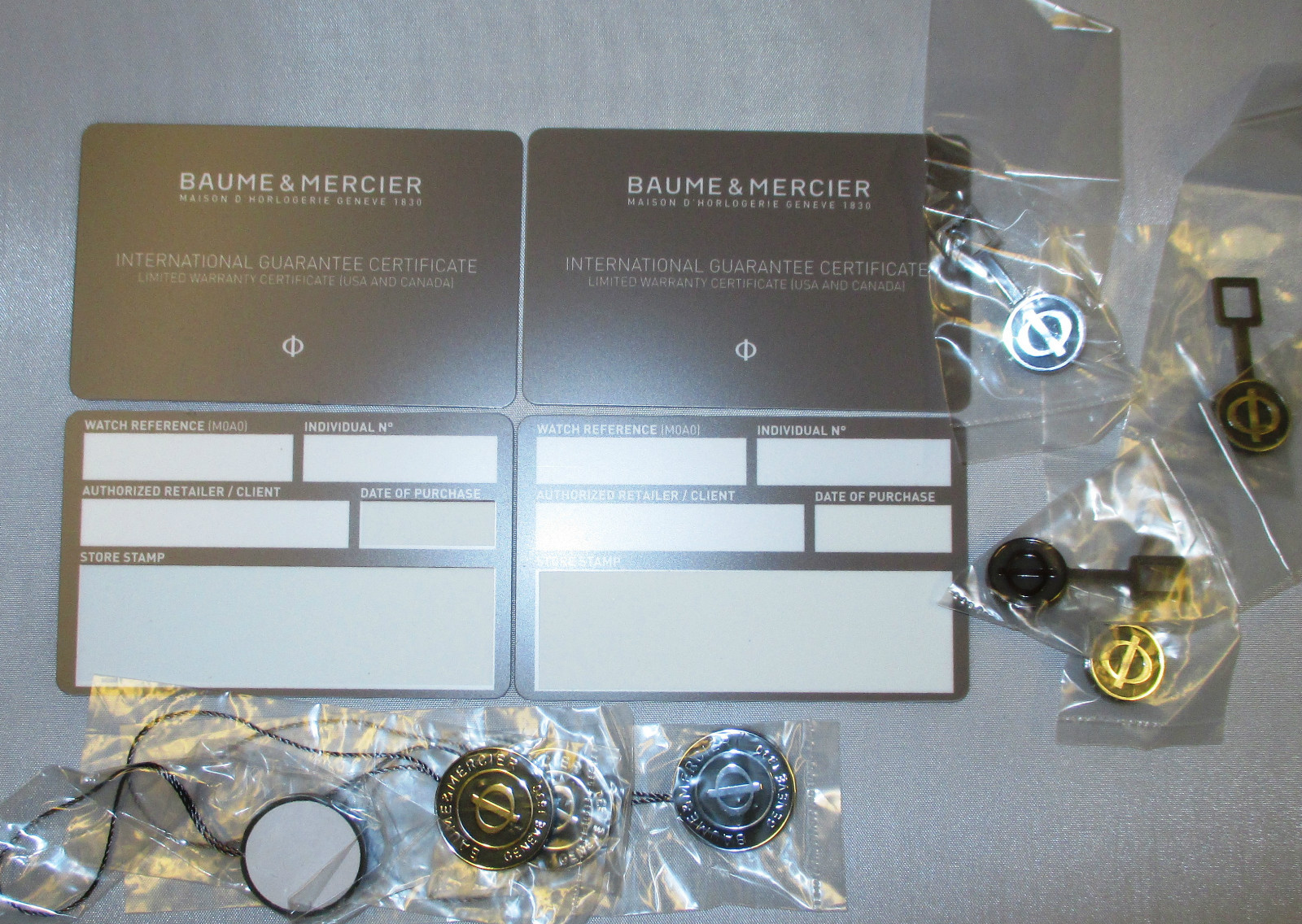 4 Baume & Mercier Watch Guarantee and Limited Warranty Certificate Cards & Tags