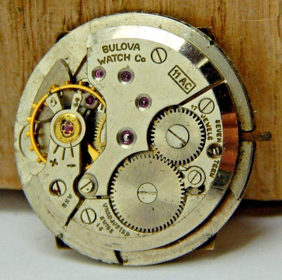 Vintage Bulova 1956 11AC 17 jewel wrist watch movement with silver tone dial