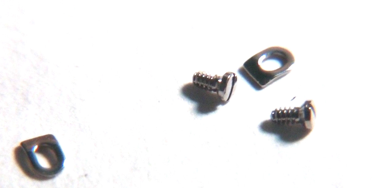ETA 2892 2 Cartier. NEW 2 case clamps, 2 case screws