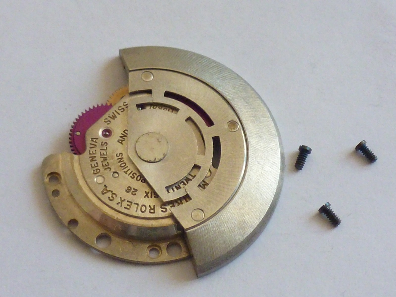 GENUINE Authentic Rolex Rotor + bridge 1560 perfect condition completely screw