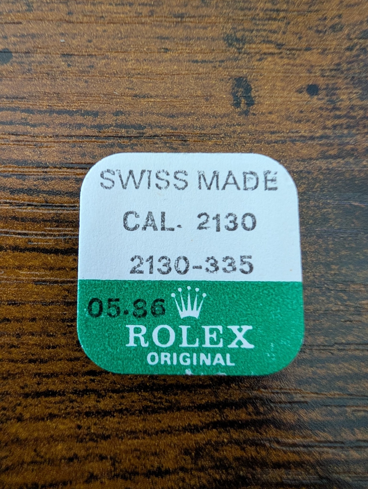 ROLEX-MINUTE PINION WITH CANNON PINION-FACTORY SEALED-CAL 2130 PART 2130-335