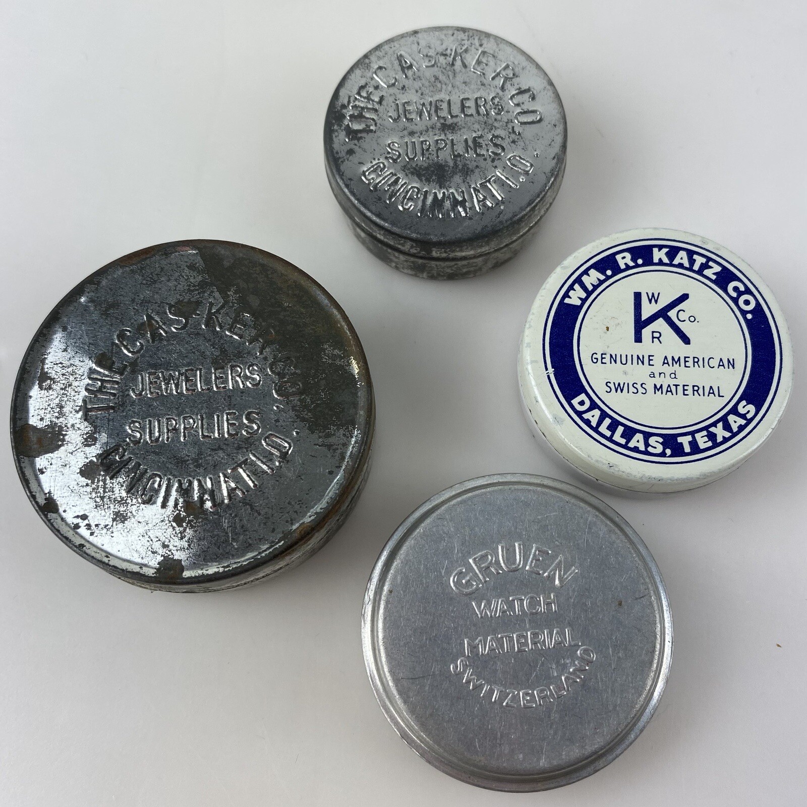 LOT 4 JEWELERS WATCH TINS Gruen Casker Katz Parts Texas Switzerland Ohio Vtg