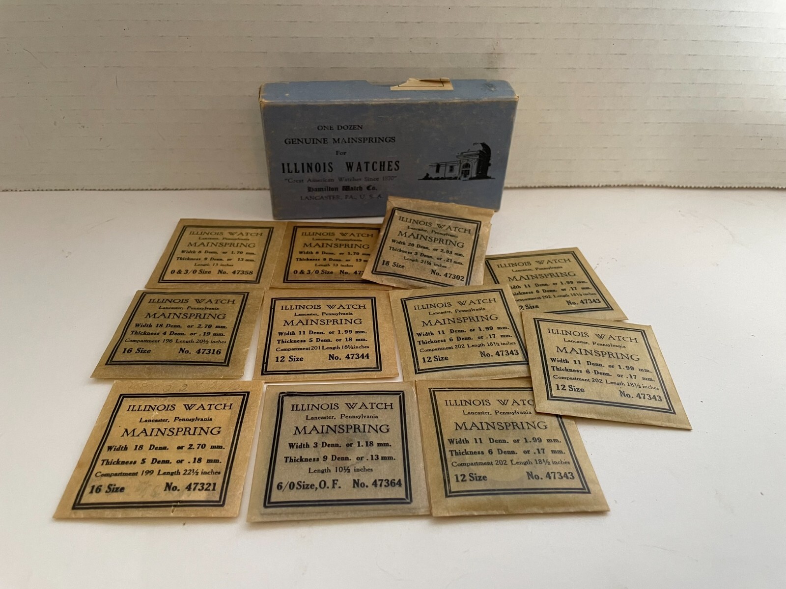 Collection of 11 Illinois Watch Mainsprings of various sizes