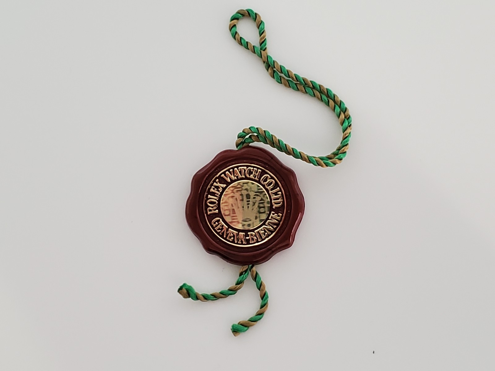 AUTHENTIC ROLEX SINGLE CROWN HOLOGRAM HANG TAG RED 1989 – 2000