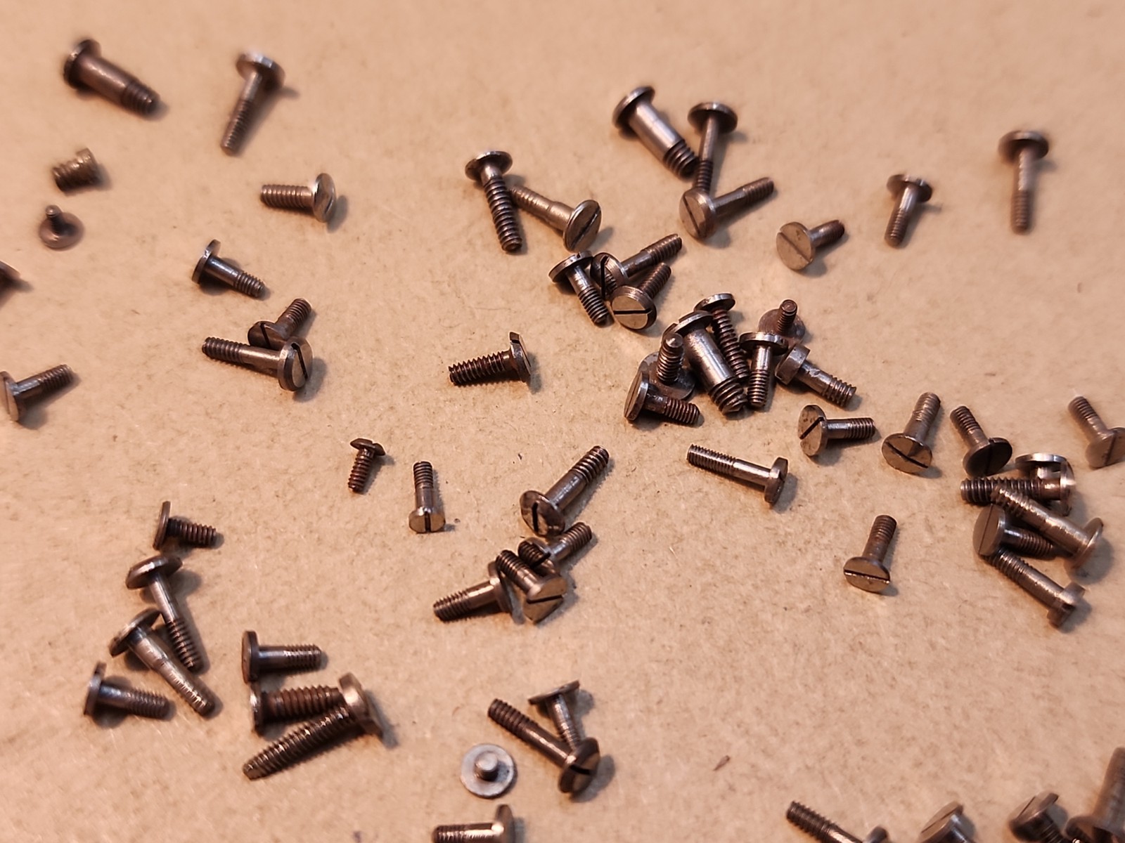 Lot Of 80 Mixed Pocket Watch/Wristwatch Case And Movement Screws Parts Spares