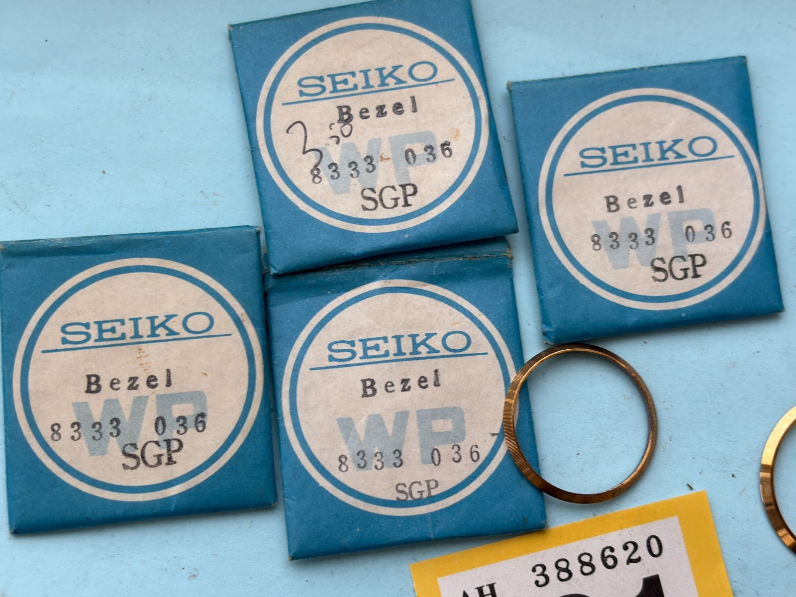 SEIKO GENUINE BEZELS 4 are 8333036 size 25.90 mm Other label faded size 30.28
