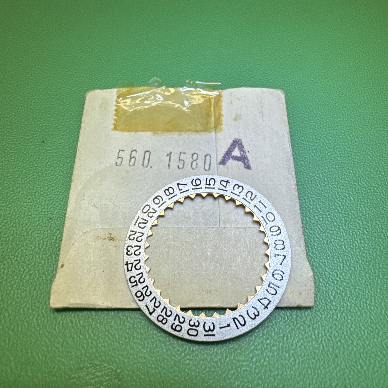 Omega 560 1580A Date Ring Black num on Silver Background FLAT – NOS