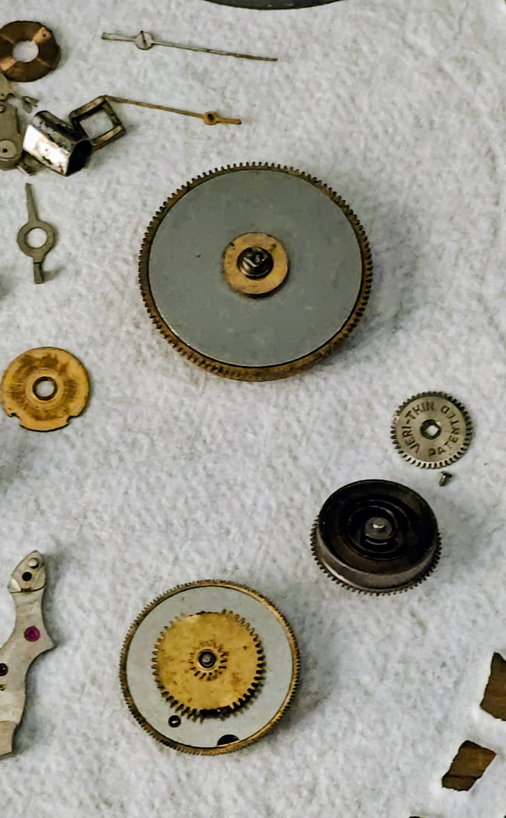 Vintage Watch Parts Including Bulova In A Small Metal Tin Can Approx 13 X 38mm