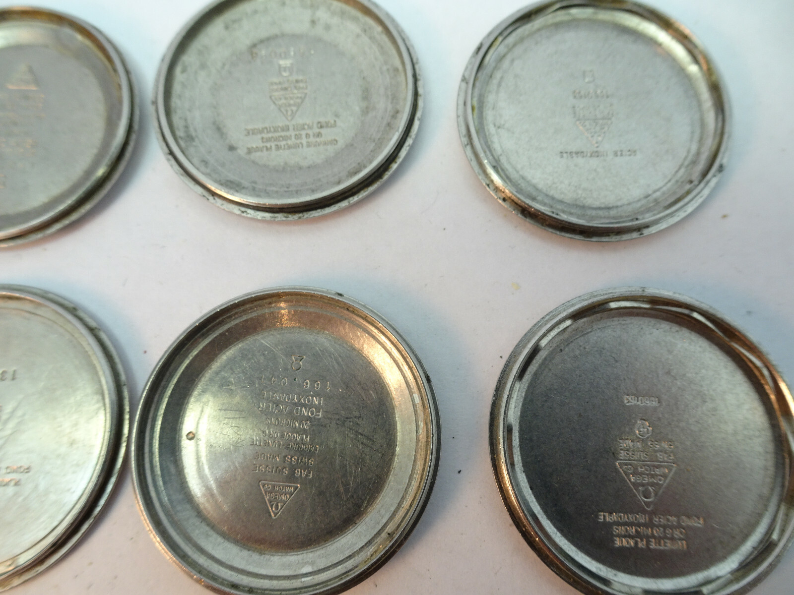 Omega vintage lot of stainless steel screwback watch covers for restorations