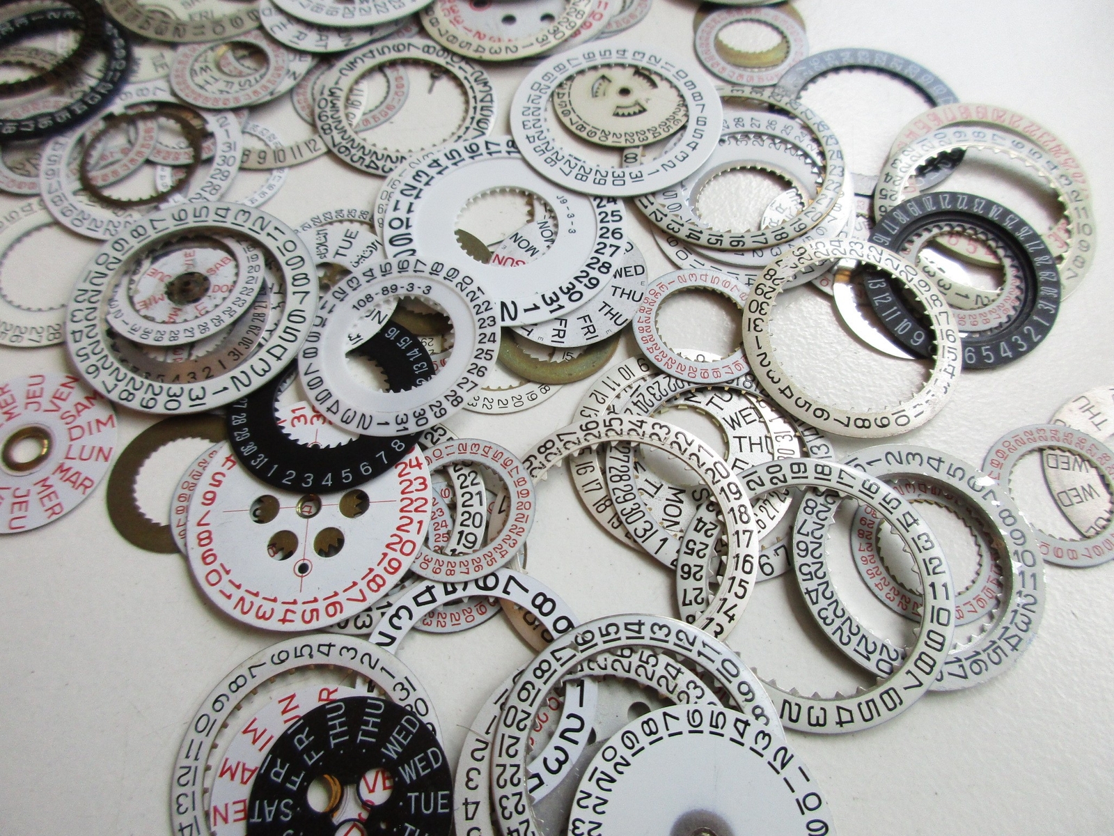 Lot of used Day and Date disks watch movement parts