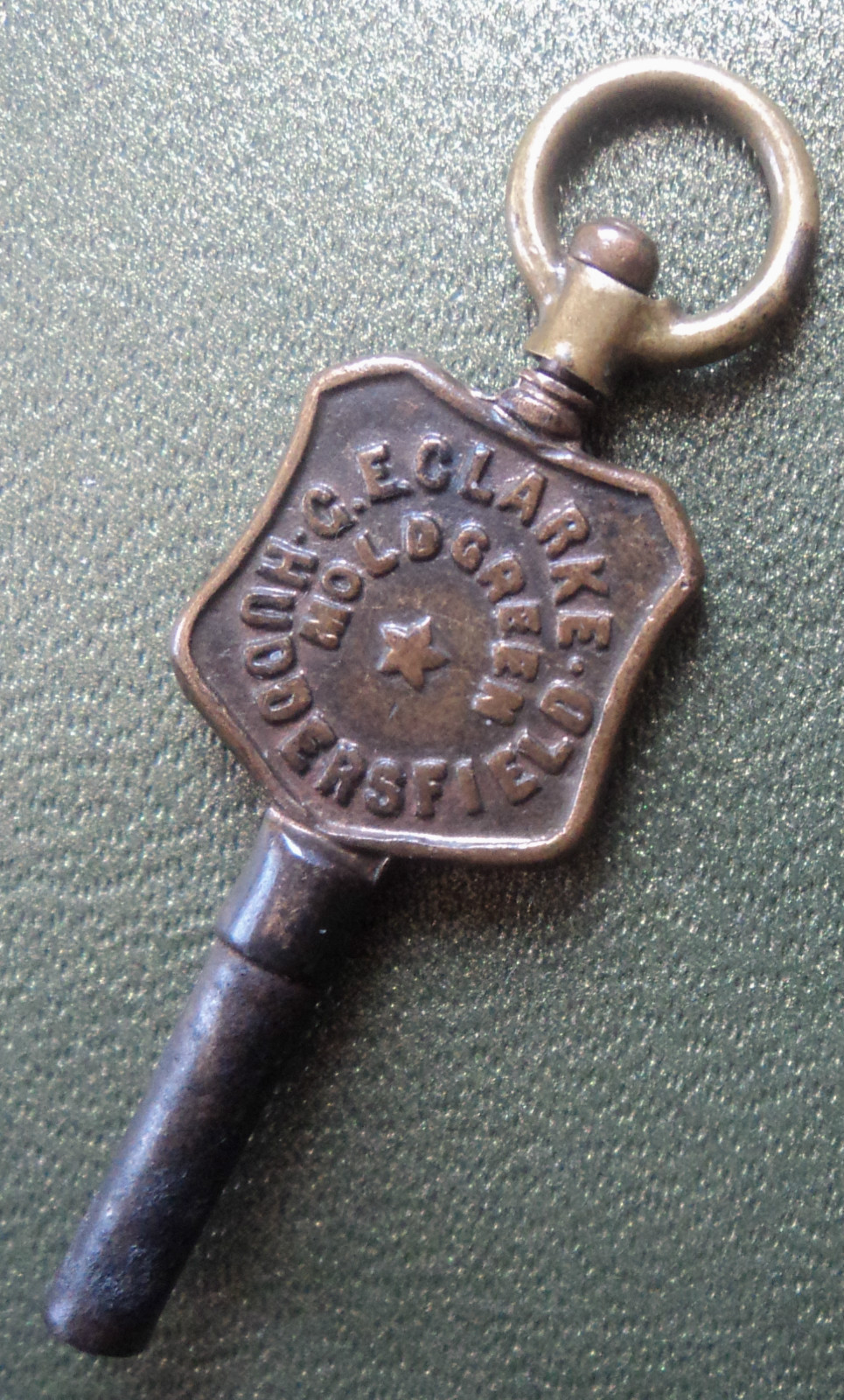Advertising Pocket Watch Key – G.E. Clarke of Moldgreen Huddersfield Yorkshire