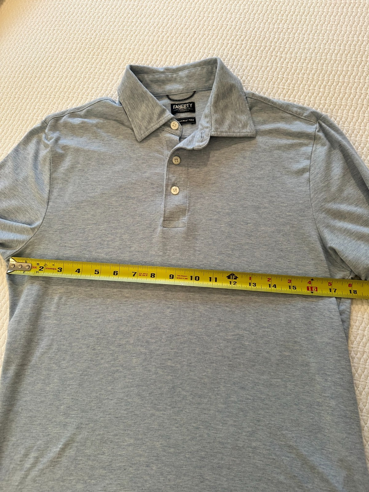 Faherty movement polo shirt, small, Cardiff Blue Heather