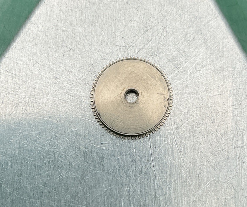 Bulova 11AF PART #1 Barrel and Cover watch parts. Preowned. (11A9)