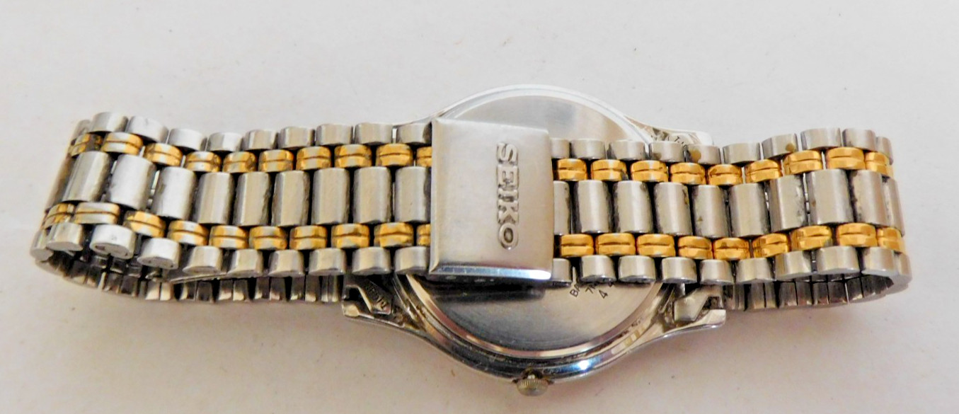 SEIKO QUARTZ DAY & DATE MOVEMENT #7N43 CASE # 7N43-7819 RUNNING. NEEDS SERVICE.