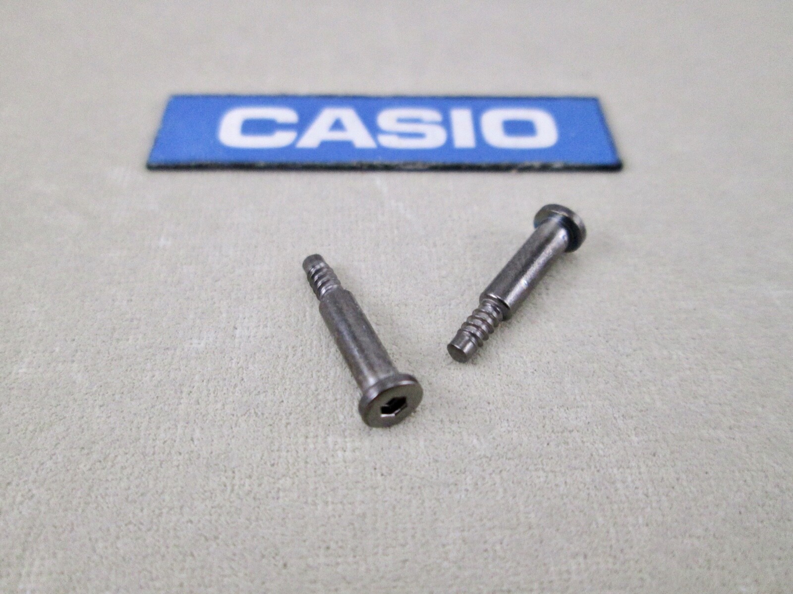 Genuine Casio G-Shock G-1400 GA-1000 GA-1100 GW-4000 watch band screws X 2