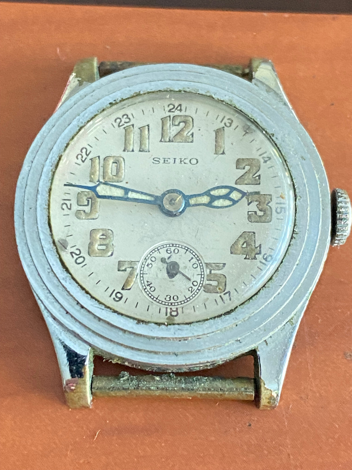 VINTAGE SEIKO WWII MILTARY DIAL. 23.65MM , MOVEMENT IS SWISS, NOT RUNNING