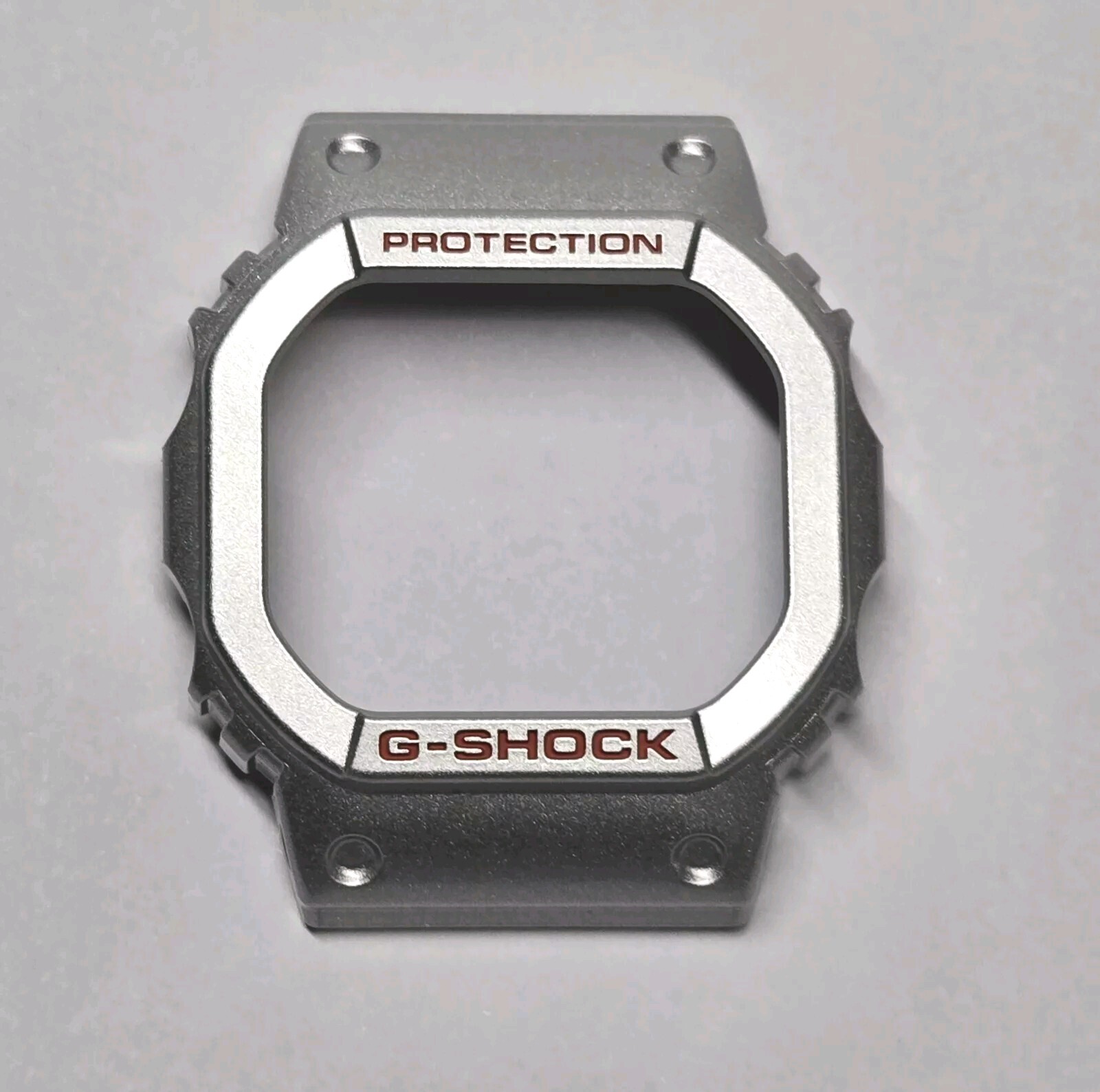 Genuine Casio part BEZEL for G SHOCK DW5600EU-8A3 METALLIC SILVER Tone **