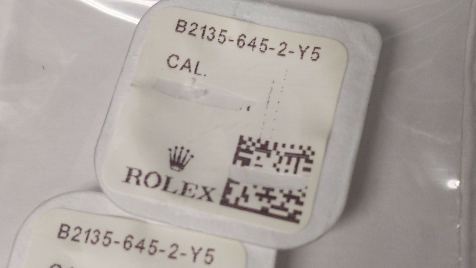 Genuine Rolex 2135 645-2 date star clip open/NEW. Package will be opened for ind