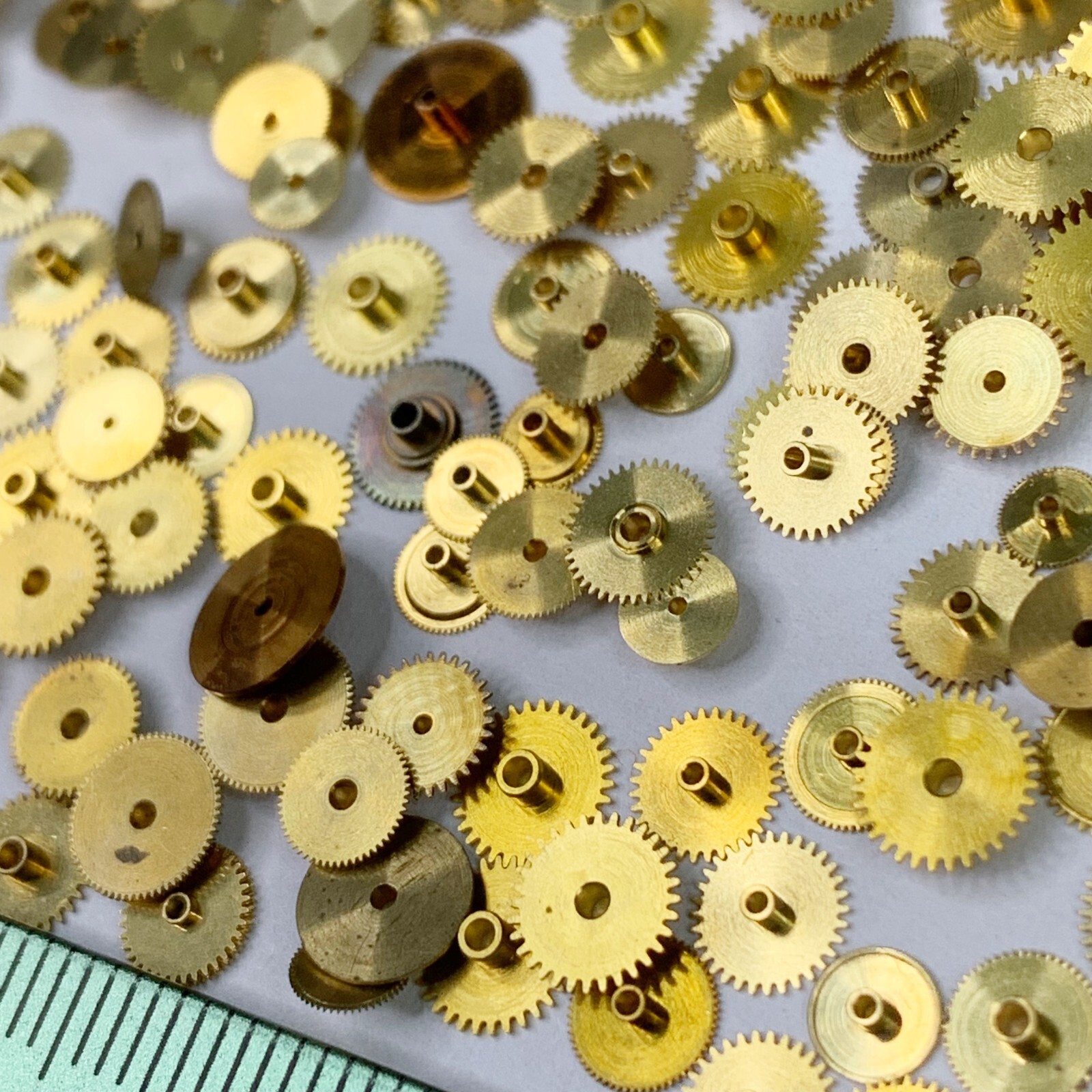 100 Gold Hour Wheels Steampunk Gears Repair Part Watchmaker Lot NOS Altered Art