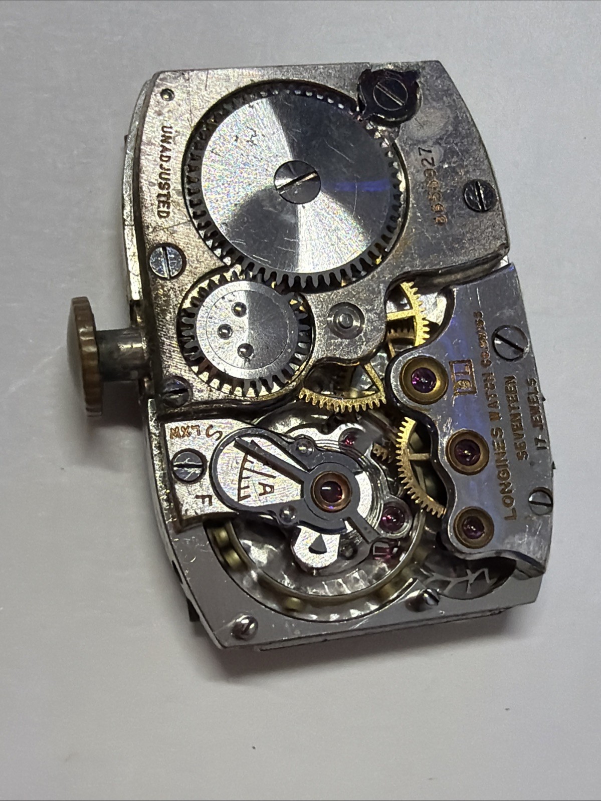 Vintage Longines 9L 17 jewel men’s wrist watch movement with hands. WORKING