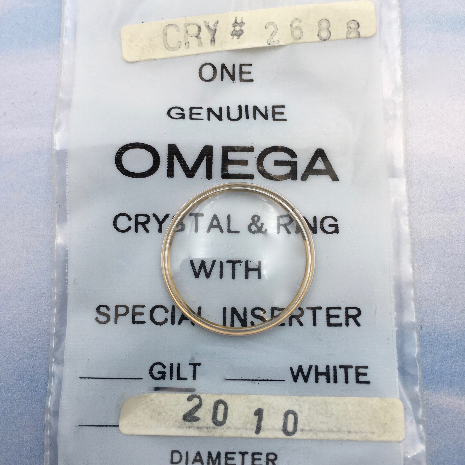 Genuine Omega Crystal # 2688 W/ Retainer Ring 21.10 mm. Open Package.