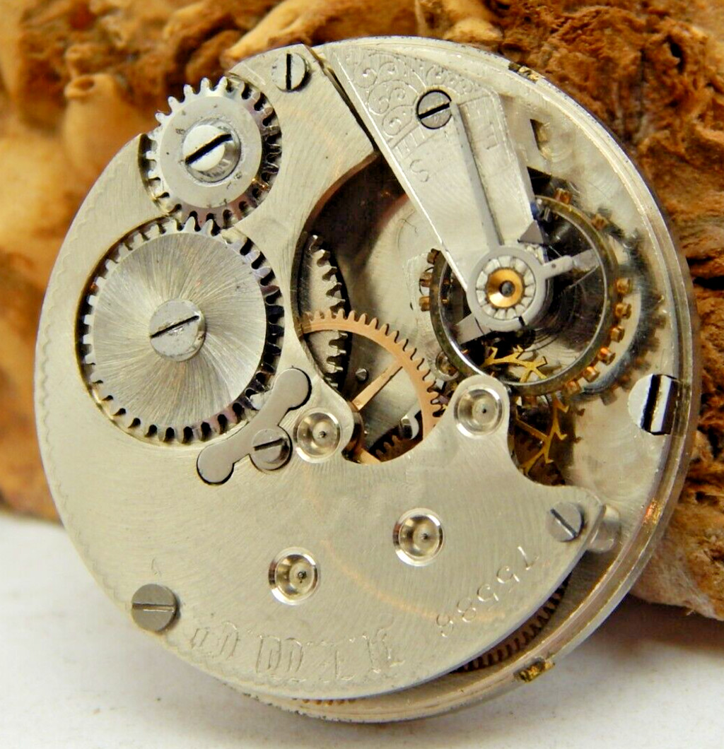 Antique Pocket Watch Movement New England 0 size open face with dial and hands
