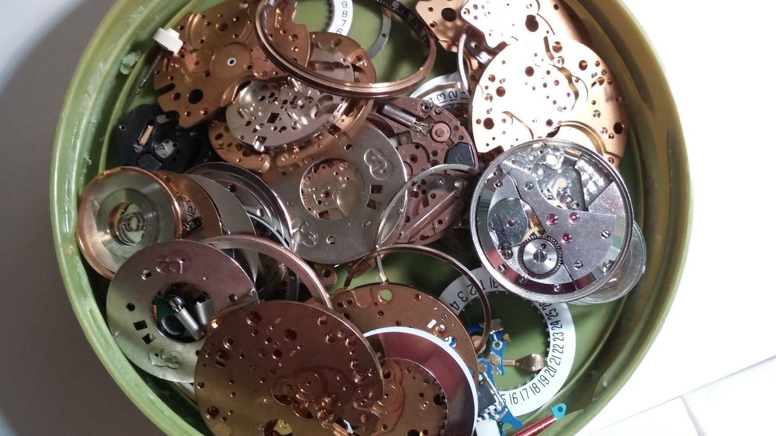 1 LOT of ETA mainplates, parts, calendar date disks, wheels for repair