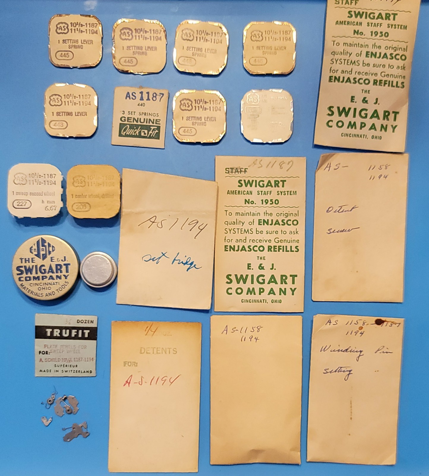 SB2-010: Lot of NOS Watch Parts AS 1187/1194 – Levers, Springs, Staffs, Gears
