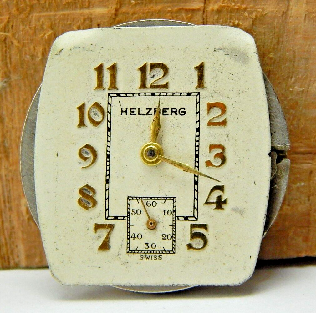 Vintage Helzberg Sleda 14-8 7 jewel men’s wrist watch movement with case back