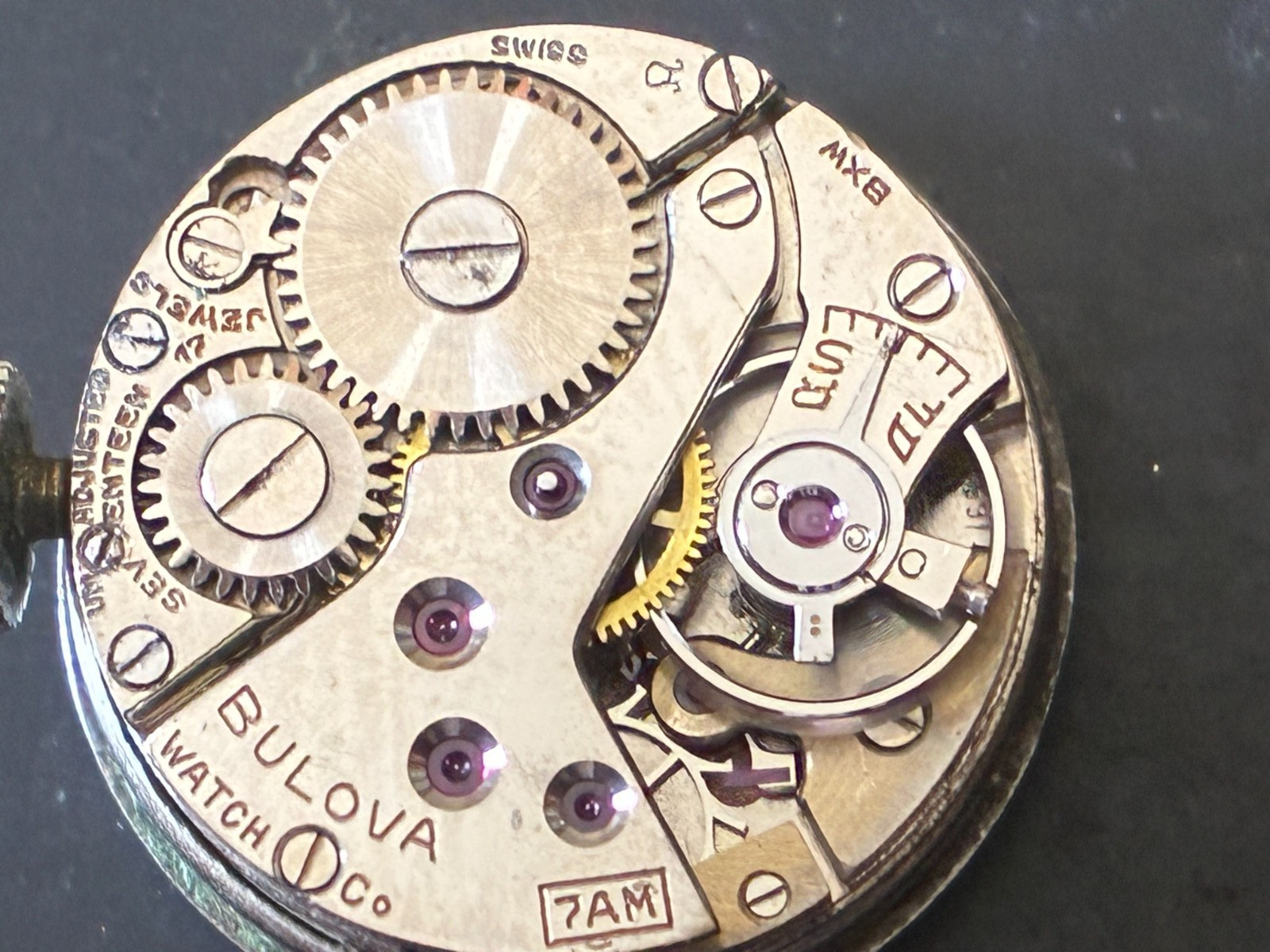 Vintage Bulova 7AM BXW Round Watch 17j Movement w/ Dial & Stem. Running. 17.4mm